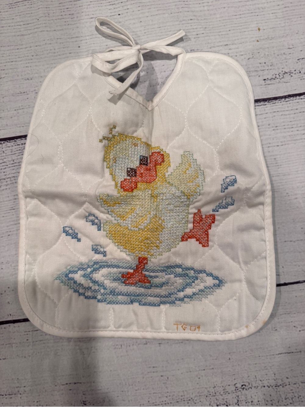 Vintage White Quilted Baby Bib with Cross-Stitch Duck
